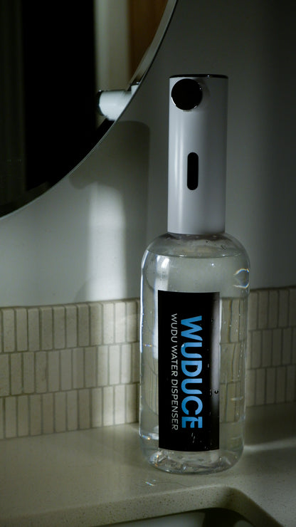 Wudu Water Dispenser on bathroom sink